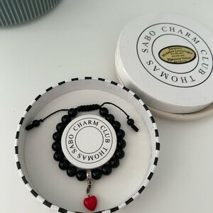 Thomas Sabo Black Bracelet with Red Heart Charm